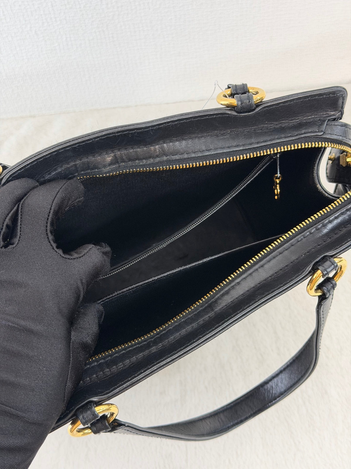 CHANEL Black Leather Square Tote Bag with Embossed Logo