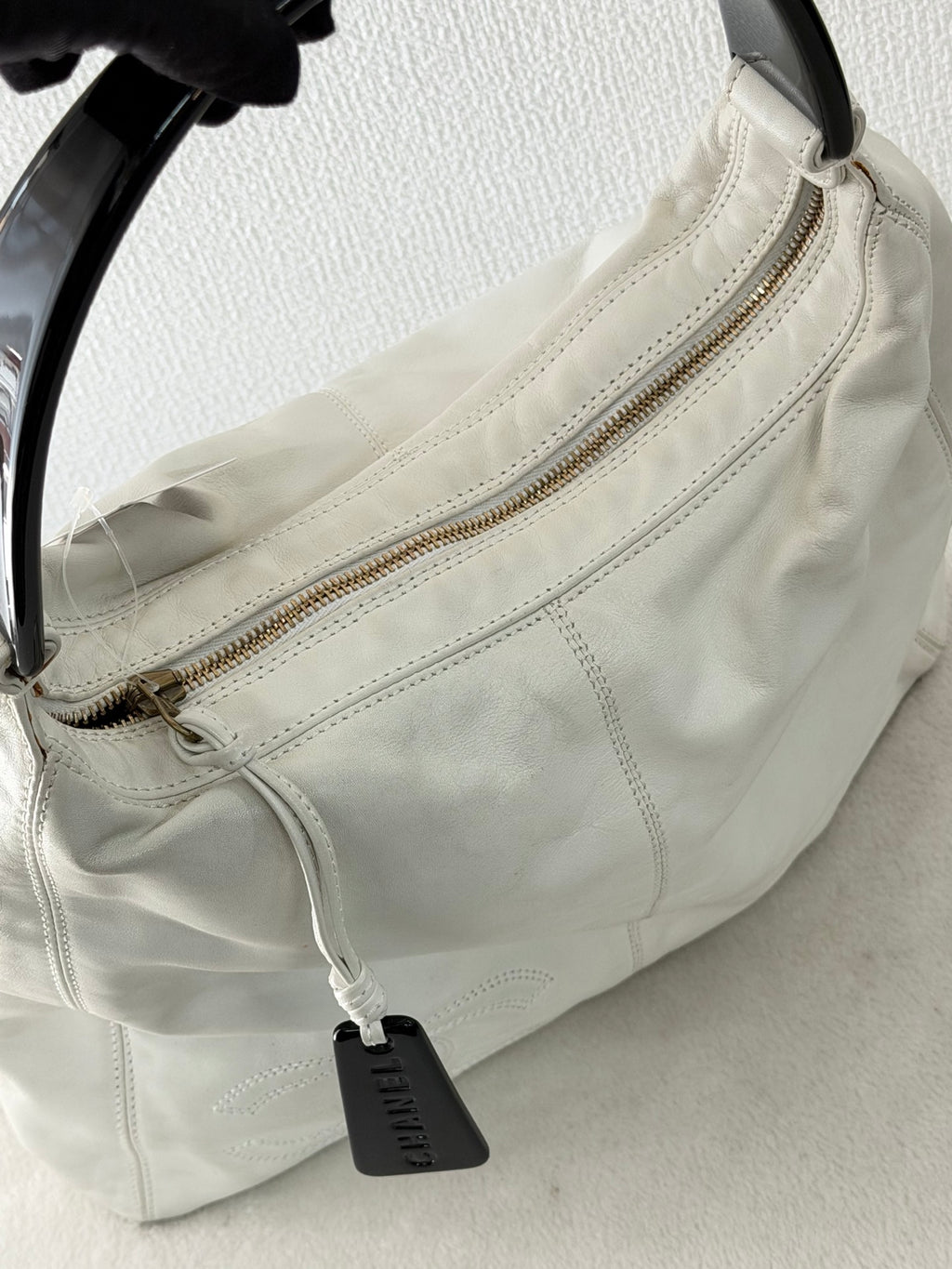 CHANEL White Leather Hobo Bag with Black Resin Handle Stitched CC