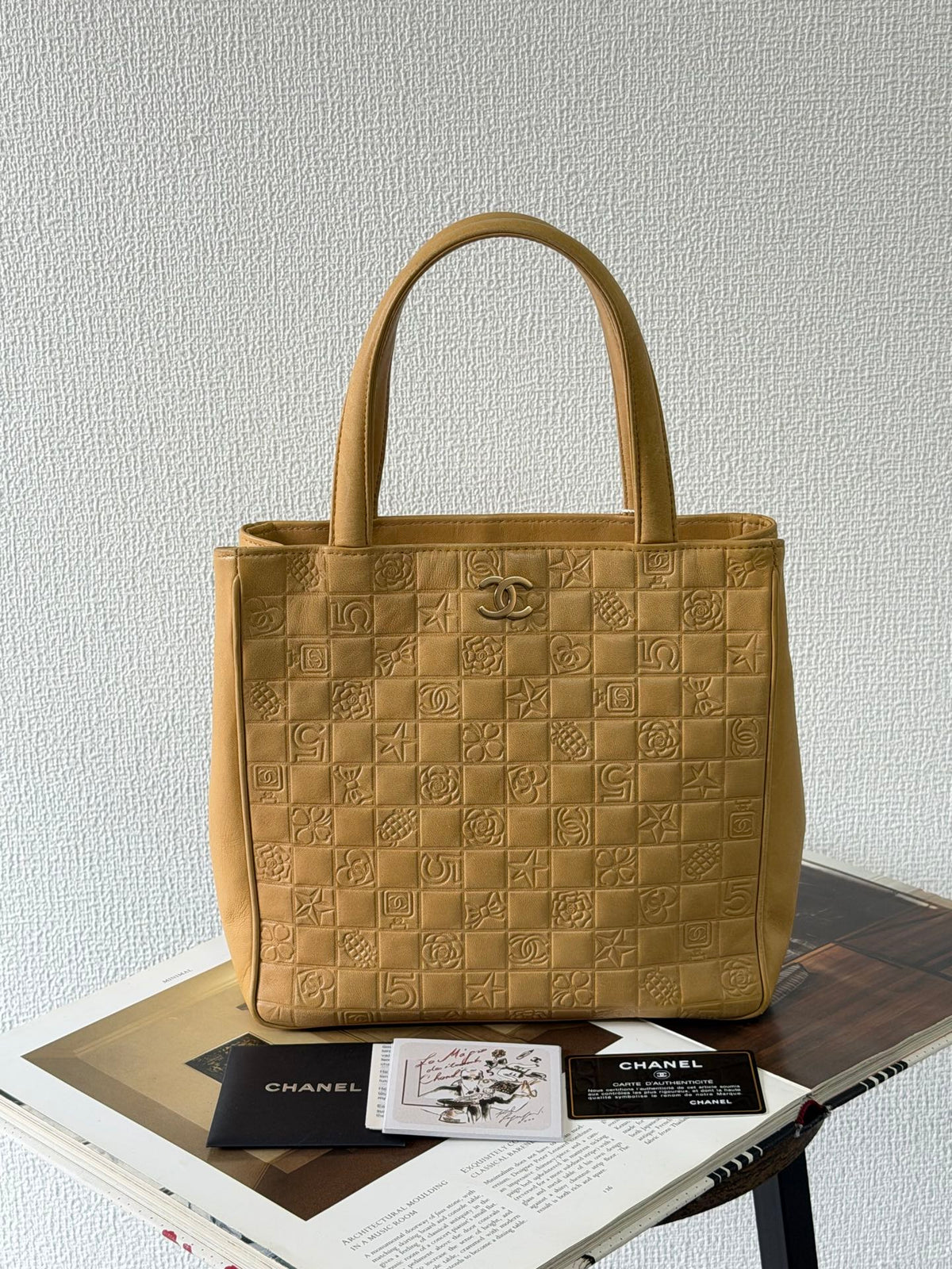 CHANEL Icon Line Embossed Tote Bag