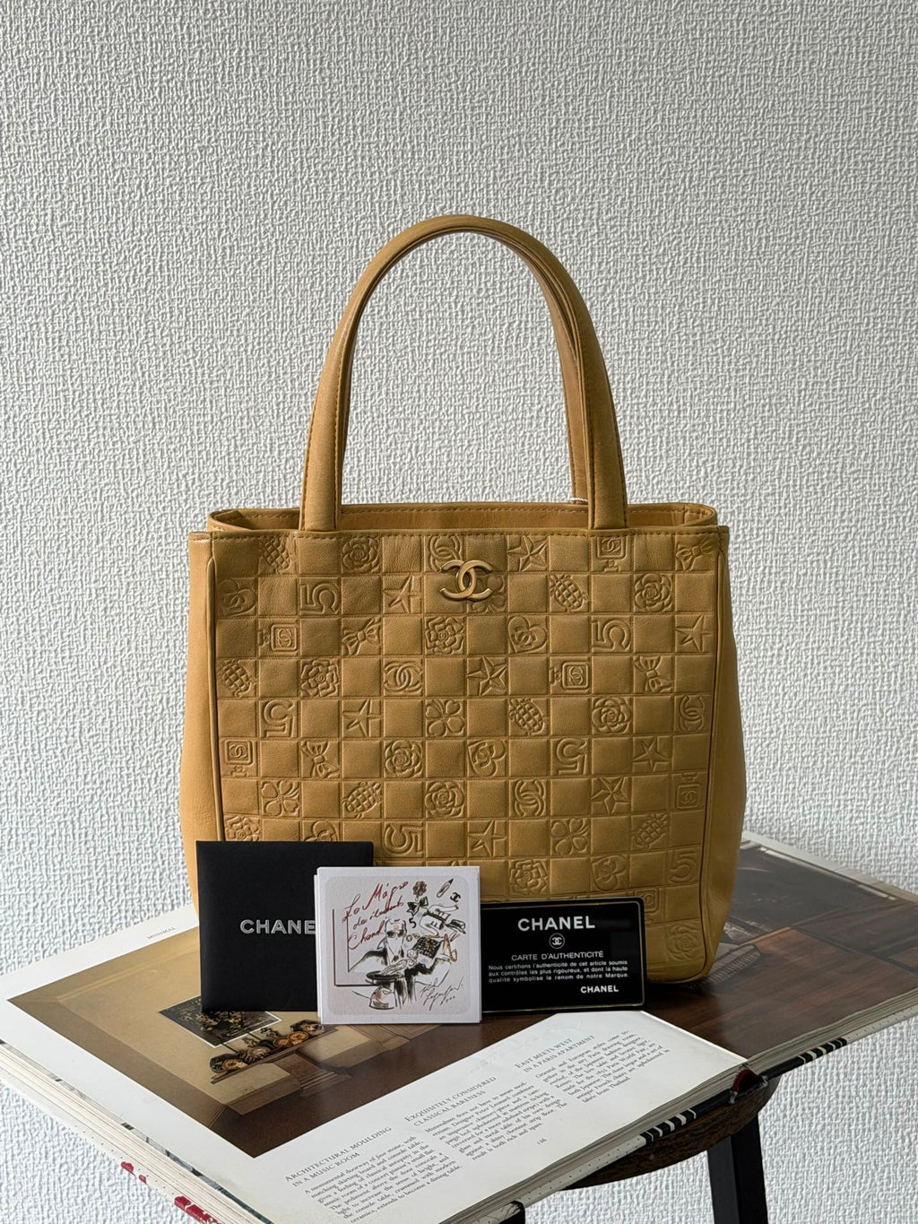 CHANEL Icon Line Embossed Tote Bag