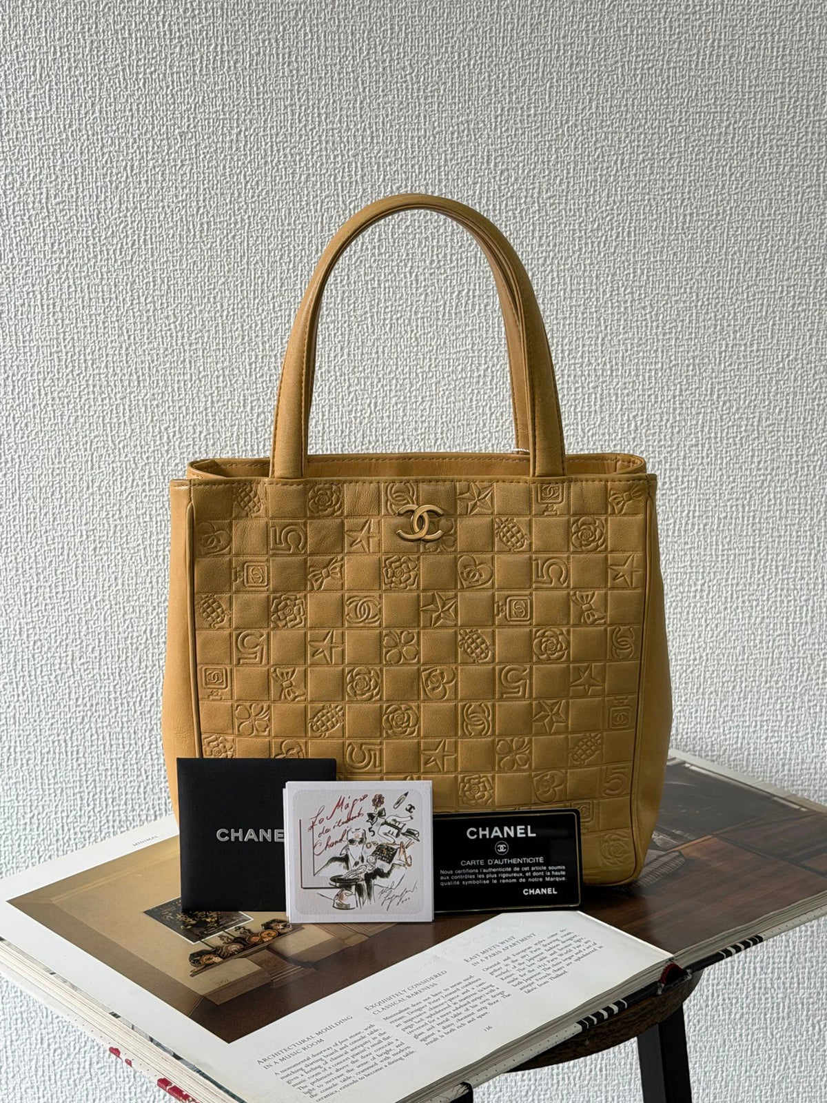 CHANEL Icon Line Embossed Tote Bag