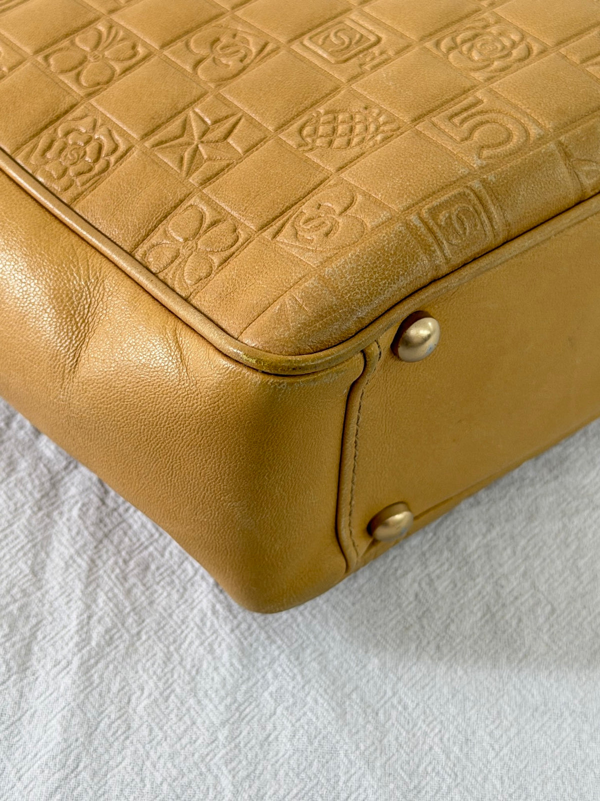 CHANEL Icon Line Embossed Tote Bag