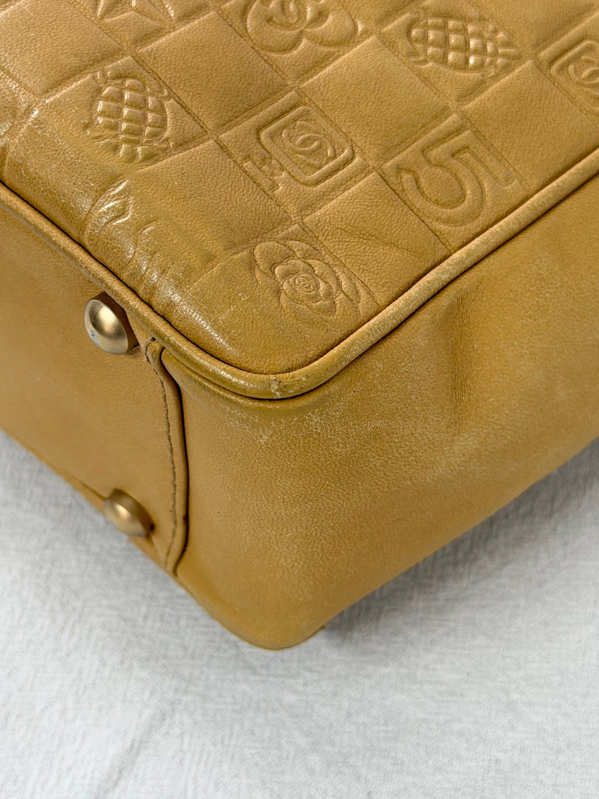 CHANEL Icon Line Embossed Tote Bag