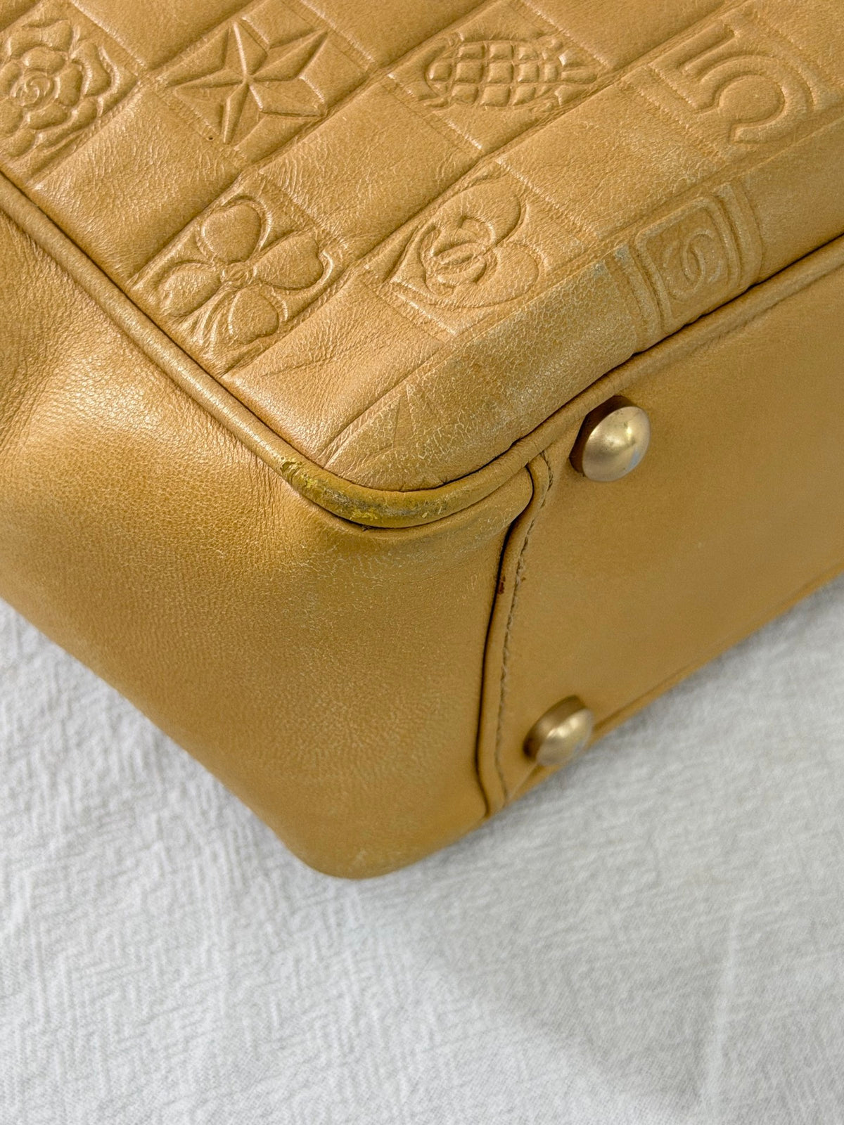 CHANEL Icon Line Embossed Tote Bag