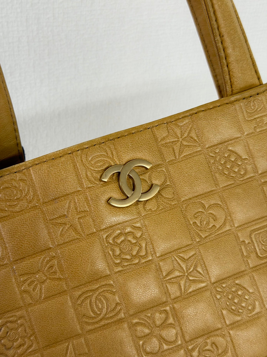 CHANEL Icon Line Embossed Tote Bag