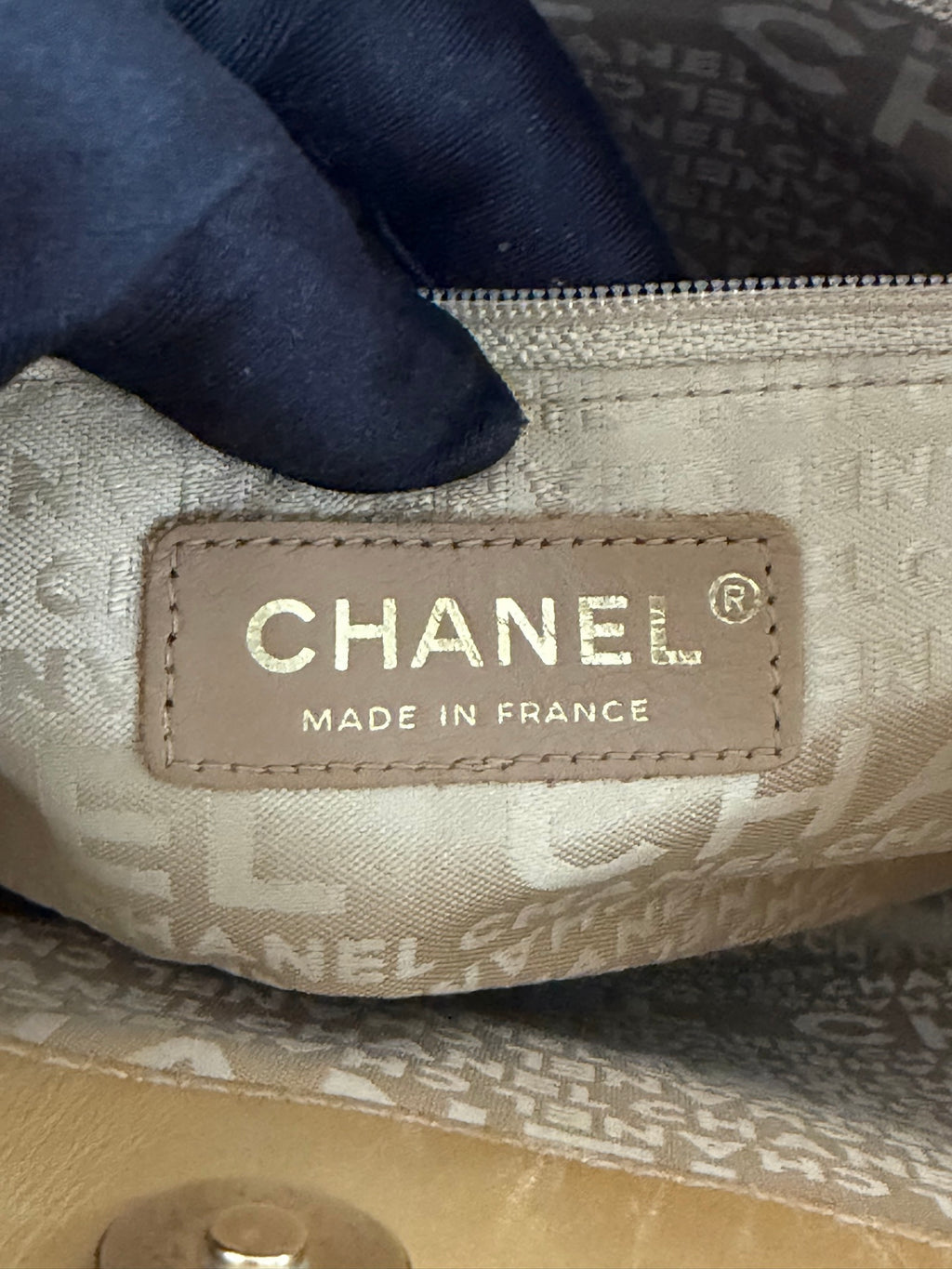 CHANEL Icon Line Embossed Tote Bag
