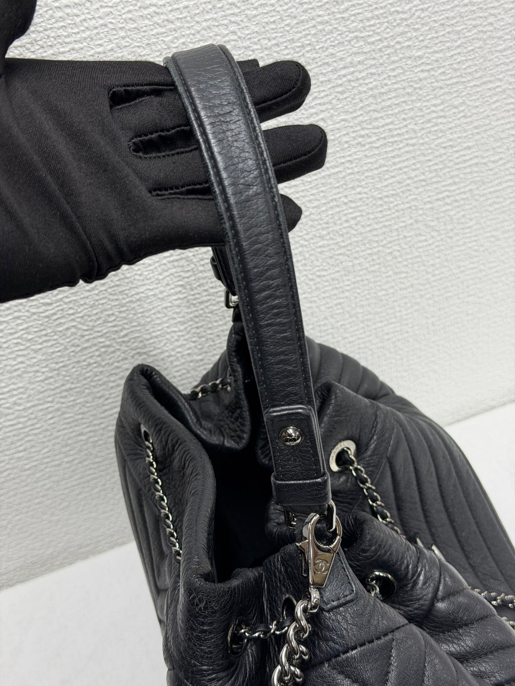 CHANEL Caviar Skin Chevron Drawstring Backpack / Bucket Bag