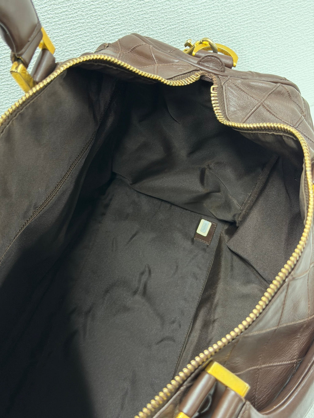 CHANEL Quilted Lambskin Top Handle Duffle Bag