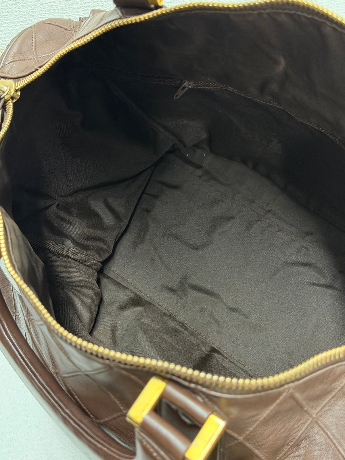 CHANEL Quilted Lambskin Top Handle Duffle Bag