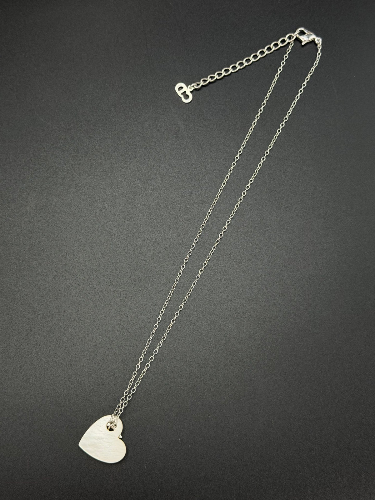 Christian Dior  D Logo Heart Shell Pendant Necklace Silver