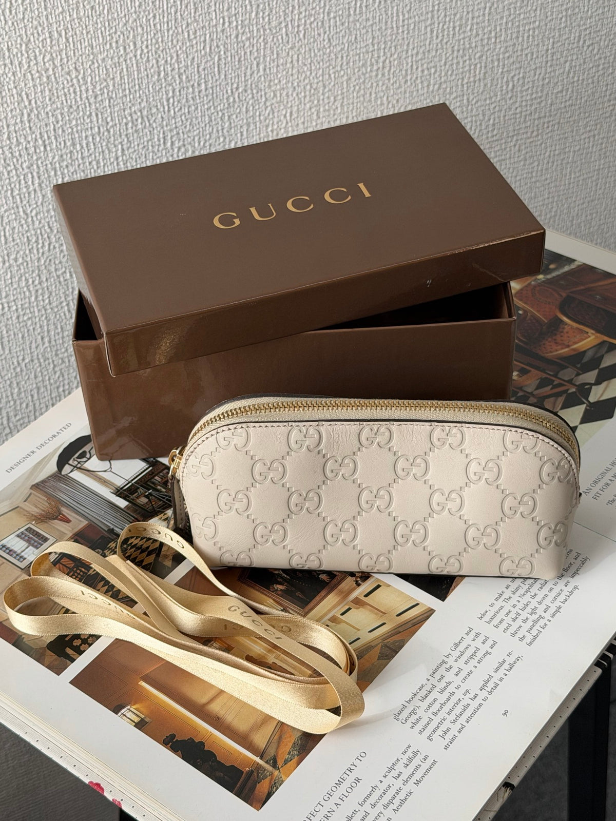 GUCCI  Guccissima GG Embossed Leather Cosmetic Pouch