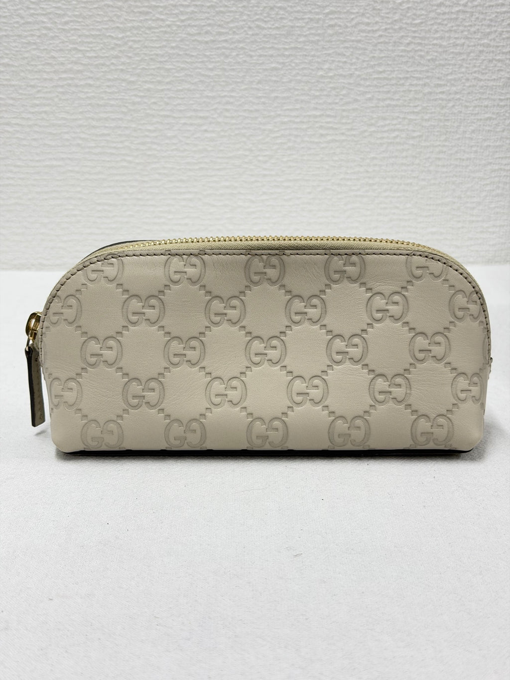 GUCCI  Guccissima GG Embossed Leather Cosmetic Pouch