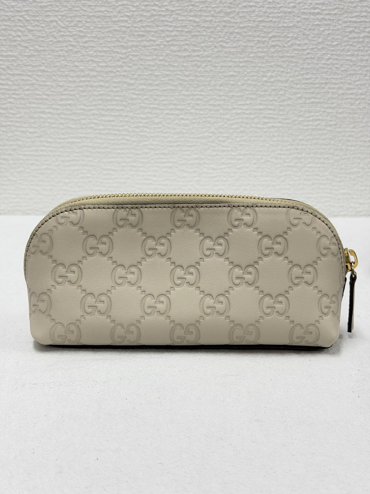 GUCCI  Guccissima GG Embossed Leather Cosmetic Pouch