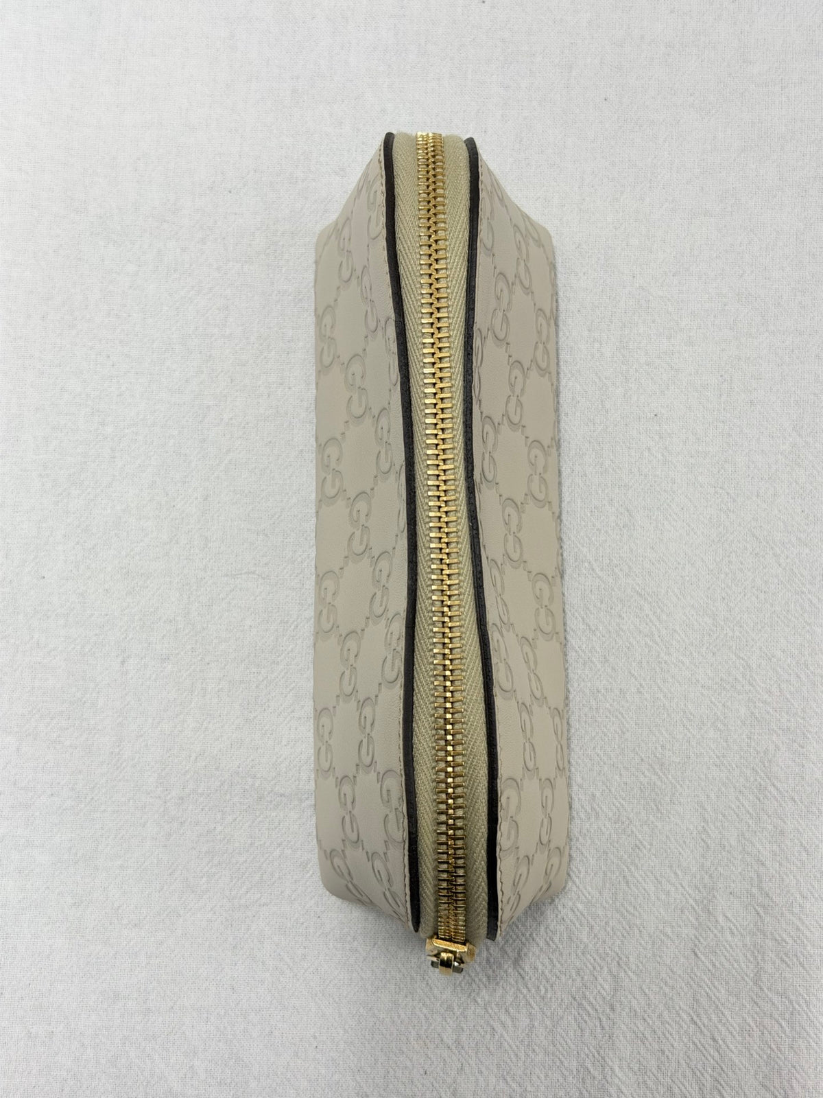 GUCCI  Guccissima GG Embossed Leather Cosmetic Pouch